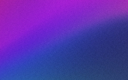 This image showcases a smooth gradient transitioning from a bright, soft purple at the top to a deep, rich blue at the bottom. The texture appears to consist of fine, scattered particles resembling cosmic dust or a starry nebula, giving it a celestial and ethereal feel. The seamless blend of colors and subtle speckled pattern evoke a sense of calm and vastness, reminiscent of outer space or an abstract representation of a twilight sky.