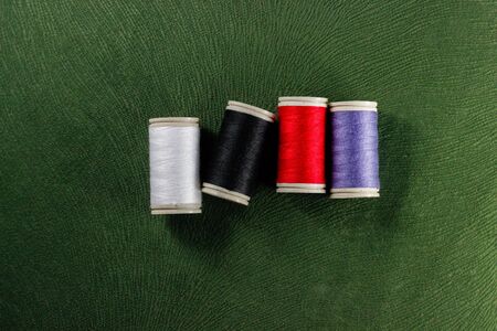 needle and thread red white black purple