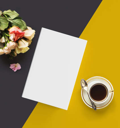 Book mockup template. Flower bouquet and coffee. Colorful background.の写真素材
