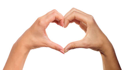 Valentine's Day 14th February. Heart silhouette with female and male hands. Heart hand woman and man. Love, passion and desire. With clipping mask.の写真素材