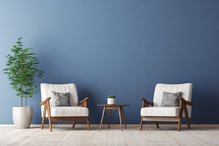 stylish living room with a white couch, brown coffee table, and two blue chairs in front of a blue wall. The couch is topped with plush pillows in shades of white and blue, and a soft throw blanket is draped over the arm.の素材
