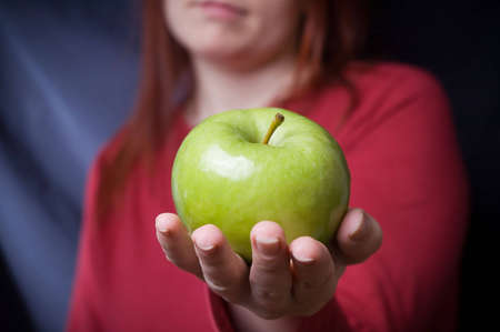 Apple in Handの写真素材