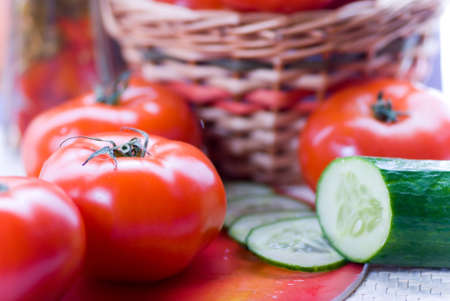 Fresh tomatoes and cucumberの写真素材