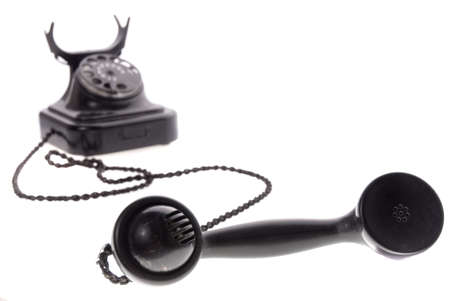 Old phone isolated on white backgroundの写真素材