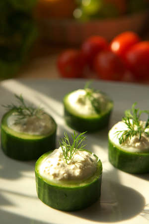 Delicious vegetable salad with onion and cucumberの写真素材