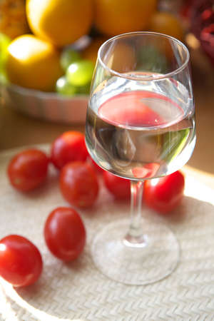 Fresh vegetarian appetizer with glass of waterの写真素材