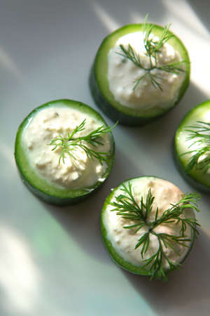 Delicious vegetable salad with onion and cucumberの写真素材