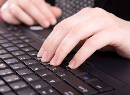 Writing on laptop