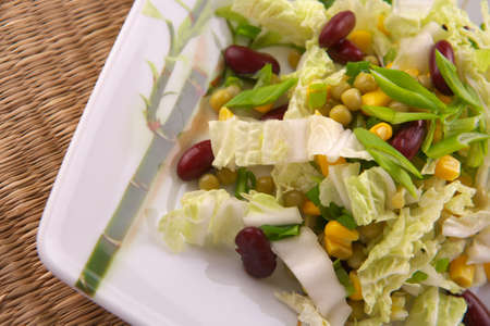 Fresh salad with corn and basilの写真素材