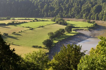 Morning landscape with fields and shadows,  River Wye at the Lancaut Peninsula, Gloucestershire, England, United Kingdom.の写真素材