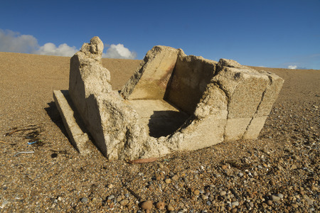 Destroyed WWII pillbox at the western end of the Chesil Beach, Abbotsbury, England, United Kingdom,...