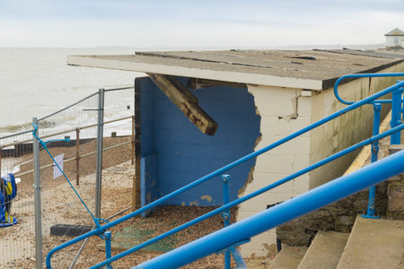 Smashed by storms, damaged beach huts  After the February 14 2014 Valentineâs Day Storm, Milford on Sea, Hampshire, England, UKのeditorial素材