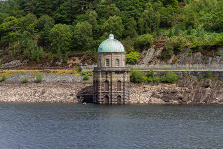 Foel Tower is the intake of the Garreg-ddu Reservoir, water starts its 73 mile journey to Birmingham. Elan Valley, Powys, Wales, United Kingdom, Europe.のeditorial素材