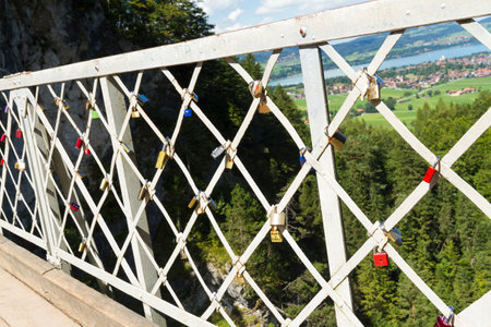 Love  locks padlock. This is on Marys Bridge, overlooking Neuschwanstein Castle, Bavarian Alps, Germany, Europeのeditorial素材