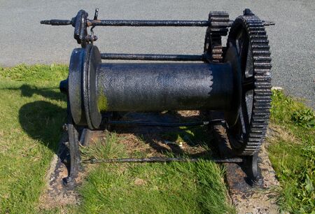 Vintage old winch for boats, painted black.の写真素材