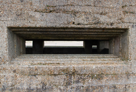Concrete loophole of WWII Vickers Machine Gun Post.の写真素材