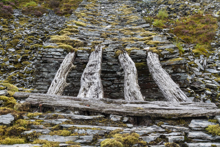 Only remaining wood bridge of gravity incline Cwm Penmachno Slate Quarry Snowdonia Wales United Kingdomの写真素材