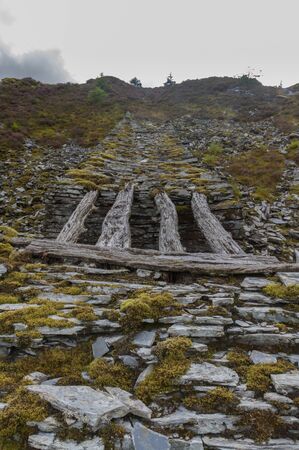 Only remaining wood bridge of gravity incline Cwm Penmachno Slate Quarry Snowdonia Wales United Kingdomの写真素材
