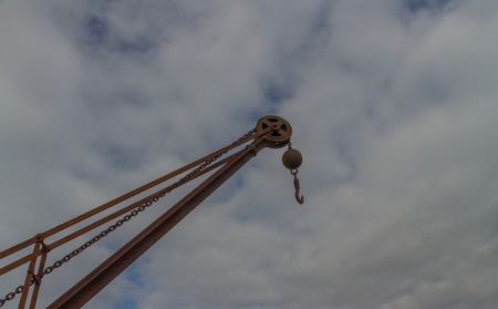 Looking up at old crane.の写真素材