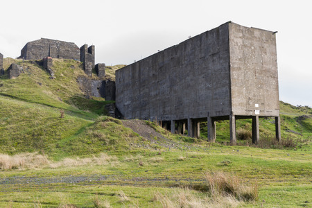 Concrete ruins remains of stone quarry loading bay. Clee Hill Shropshire England United Kingdom.の写真素材