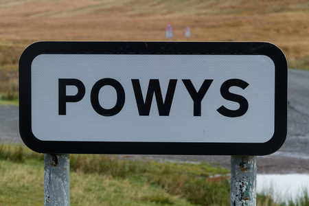 Road sign for Powys, a county in Wales, United Kingdom.の写真素材