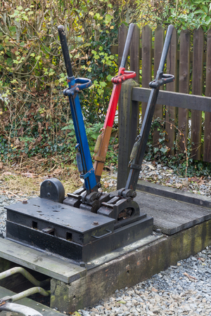 Outside exterior three railway signal semaphore levers. Vale of Rheidol Railway, Ceredigion, Wales, United Kingdom, Europe.の写真素材