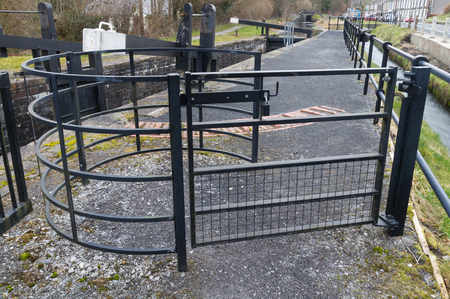 Gate used in the United Kingdom to allow people but not livestock to pass. By canal lock.の写真素材
