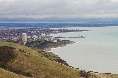 Eastbourne seen from Beach head on overcast winter day. East Sussex, England, United Kingdomの写真素材