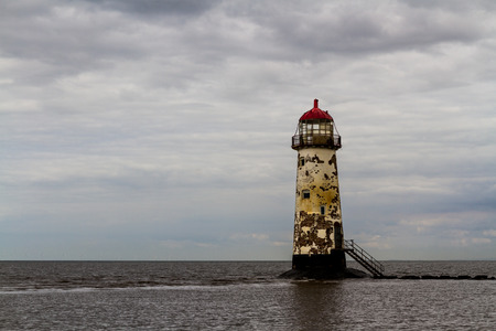 Point of Ayr derelict lighthouse, on the most northern tip of Wales. Talacre, Flintshire, United Kingdom.の写真素材