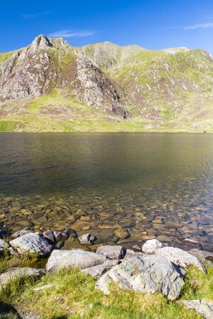 Lake Idwal and The Devil's Kitchen, Snowdonia, Wales, United Kingdom.の写真素材