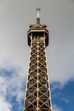 Eiffel Tower against blue sky and clouds. France, Europe.の写真素材