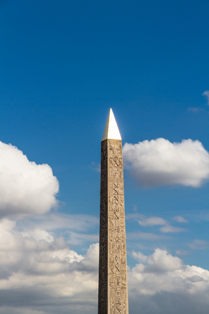 Luxor Obelisk an Egyptian obelisk in the Place de la Concorde, Paris France. Top reflecting evening sunの写真素材
