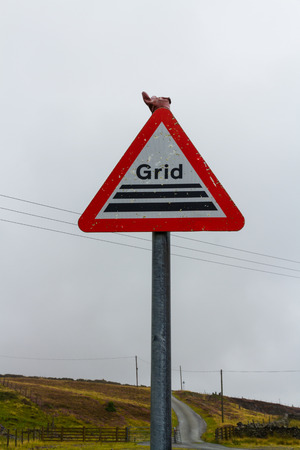United Kingdom triangular road warning sign Cattle Grid.の写真素材