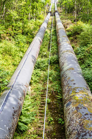The pipeline carries water from llyn or Lake Trawsfynydd to the Maentwrog hydro electric power stationの写真素材