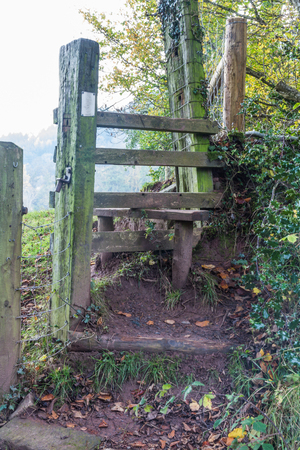 Old Wooden Stile, - stiles are common to cross field boundaries on footpaths in the United Kingdom.の写真素材