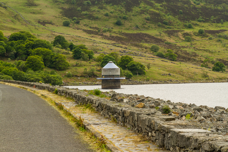 Llyn Celyn reservoir with intake tower. Supplies water to Liverpool. Powys, Wales, United Kingdom.の写真素材