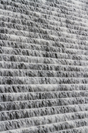 Avon Dam with water flowing down making a background. Dartmoor, Devon, England, United Kingdom.の写真素材