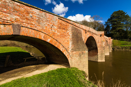 River Wye with Bredwardine bridge crossing it. Arched bridge.の写真素材