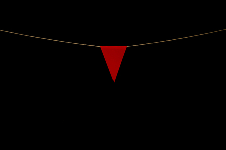 String with bunting one red triangle. Add your own characters for title or banner.の写真素材