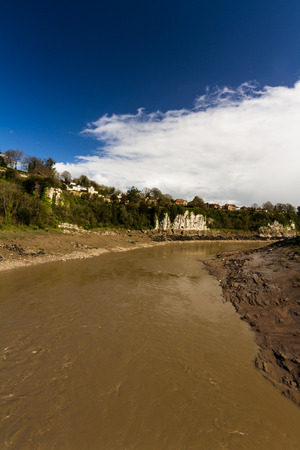The tidal River Wye, muddy at Chepstow.の写真素材