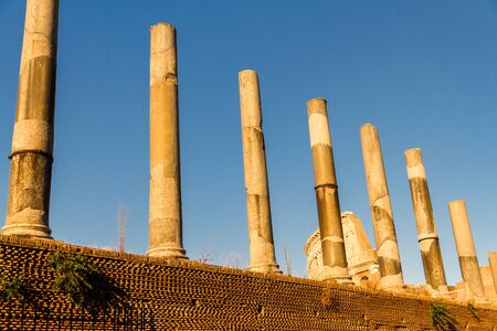 Line of Roman Columns in Rome against blue sky.の写真素材