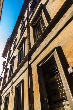 Old large frontage in very narrow street. Rome, Italy, Europe.のeditorial素材