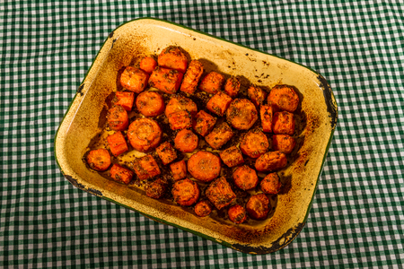 Spices on chopped carrots, roasted.の写真素材