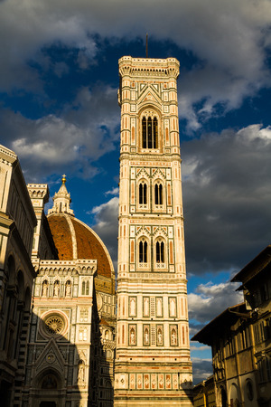 Tower of Florence Cathedral or Cattedrale di Santa Maria del Fiore, in Florence, Italy, eveningの写真素材