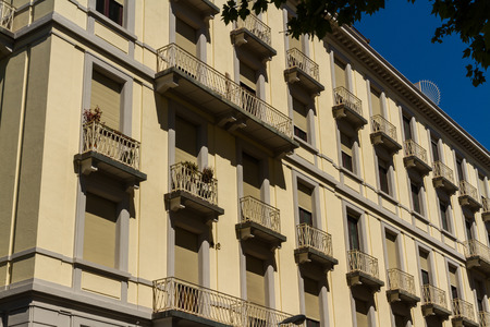 Old large frontage in very narrow street. Florence, Italy, Europe.の写真素材