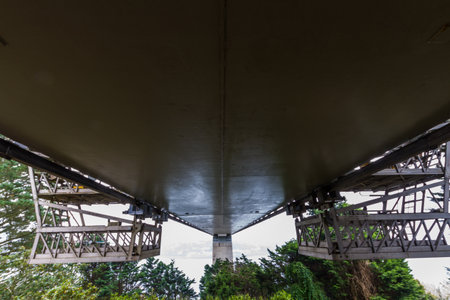 Below a metal lined bridge. Cleddau Bridge, between Neyland and Pembroke Dock, Pembrokeshire, Wales, United Kingdom.のeditorial素材