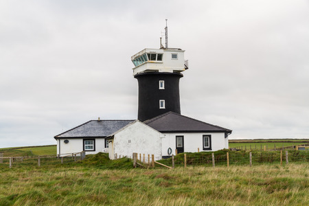 Lighthouse converted to WWII observation Tower. St Annâs Head, Dale, Pembrokeshire, Wales, United Kingdom.の写真素材