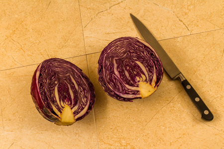 Red cabbage sliced by knife.の写真素材
