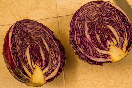 Red cabbage sliced in half.の写真素材