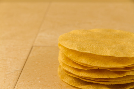 Indian poppadums stacked with copy space on left.の写真素材